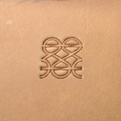 Interlocking Lines leather stamp LT090 — single impression on veg-tan leather