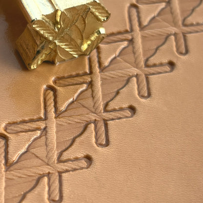 Stitches leather stamp LT092 — brass stamping tool with imprint on natural veg-tan leather