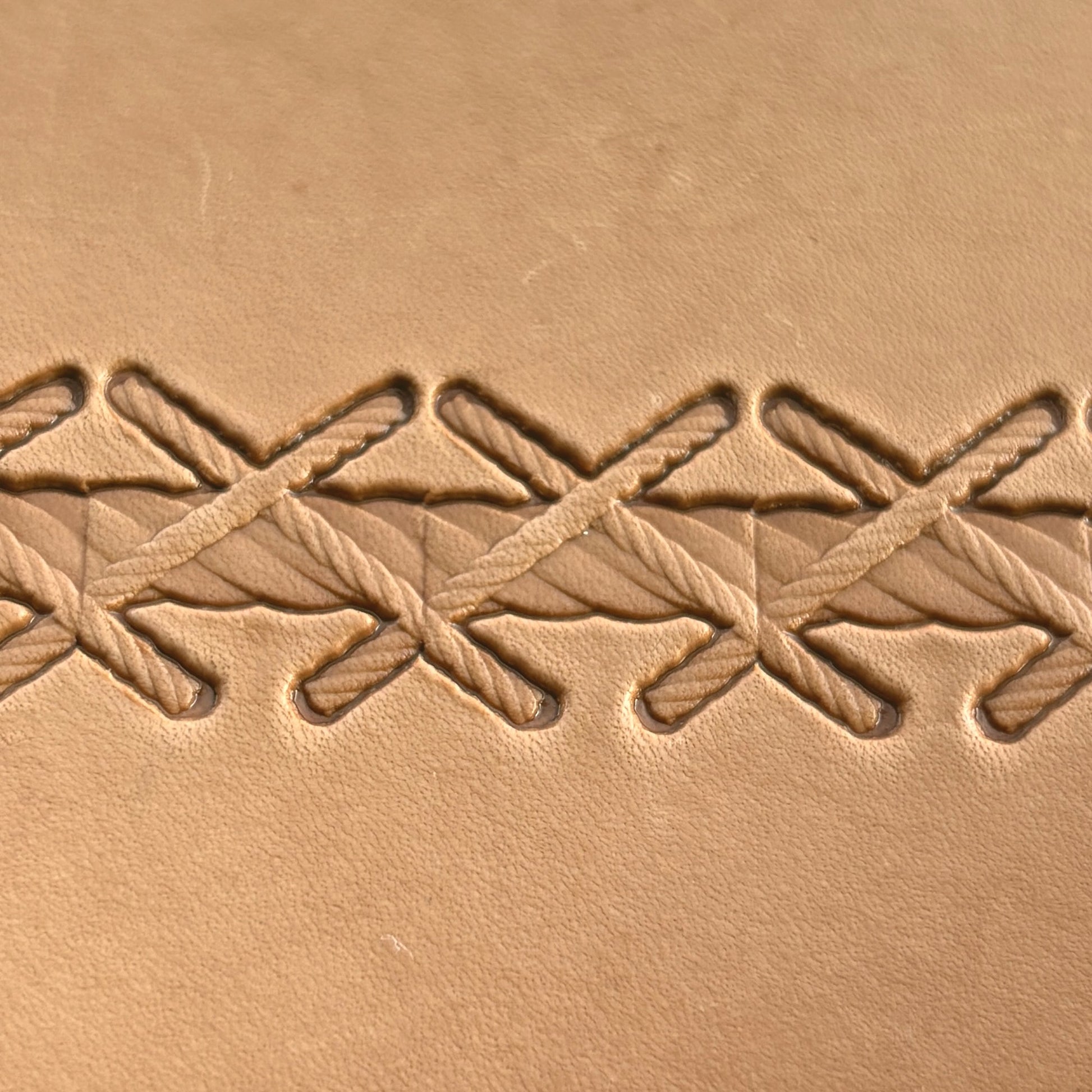 Stitches leather stamp LT092 — pattern imprint on veg-tan leather