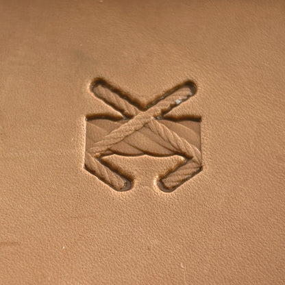 Stitches leather stamp LT092 — single impression on veg-tan leather