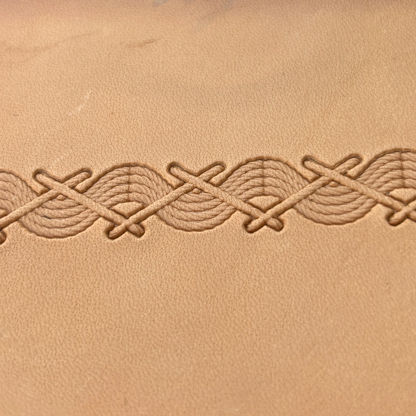 Twisted Line Stitches leather stamp LT093 — pattern imprint on veg-tan leather