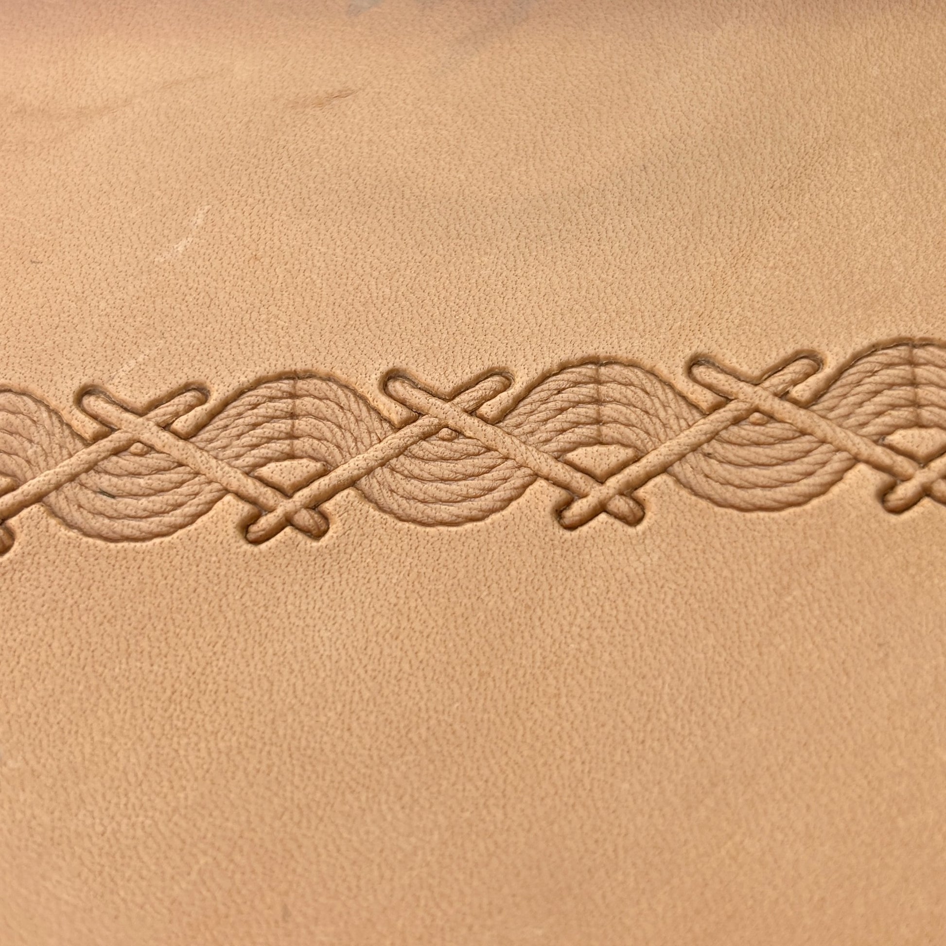 Twisted Line Stitches leather stamp LT093 — pattern imprint on veg-tan leather