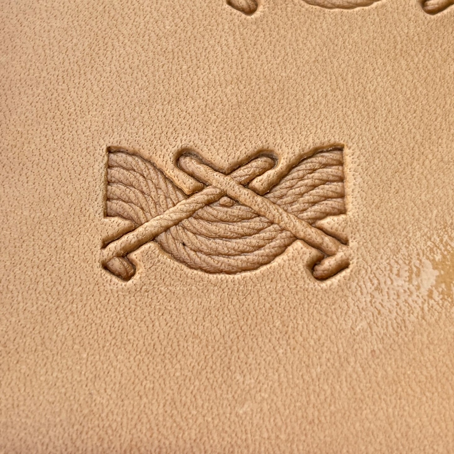 Twisted Line Stitches leather stamp LT093 — pattern imprint on veg-tan leather