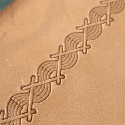 Twisted Line Stitches leather stamp LT093 — single impression on veg-tan leather