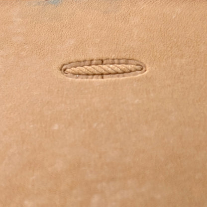 Oval Style Stitches leather stamp LT095 — single impression on veg-tan leather