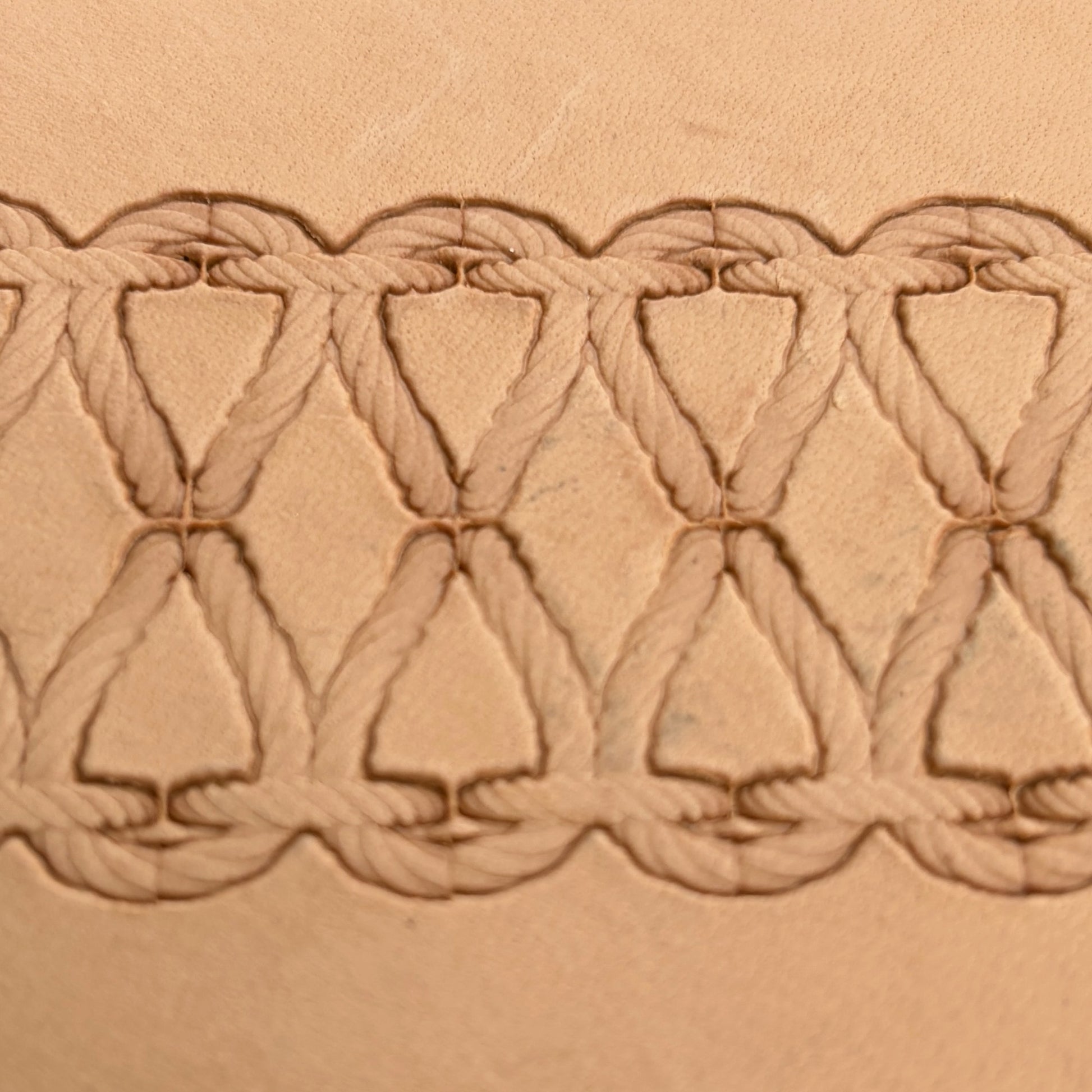 Stitches leather stamp LT098 — pattern imprint on veg-tan leather