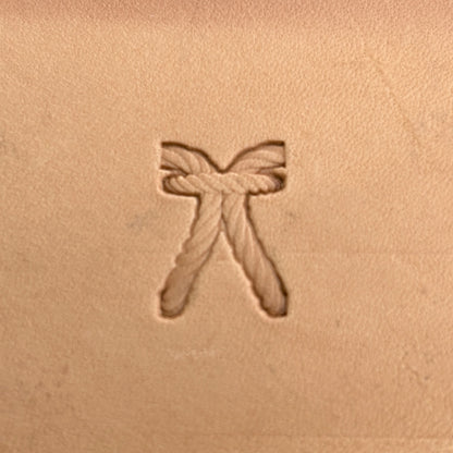 Stitches leather stamp LT098 — single impression on veg-tan leather