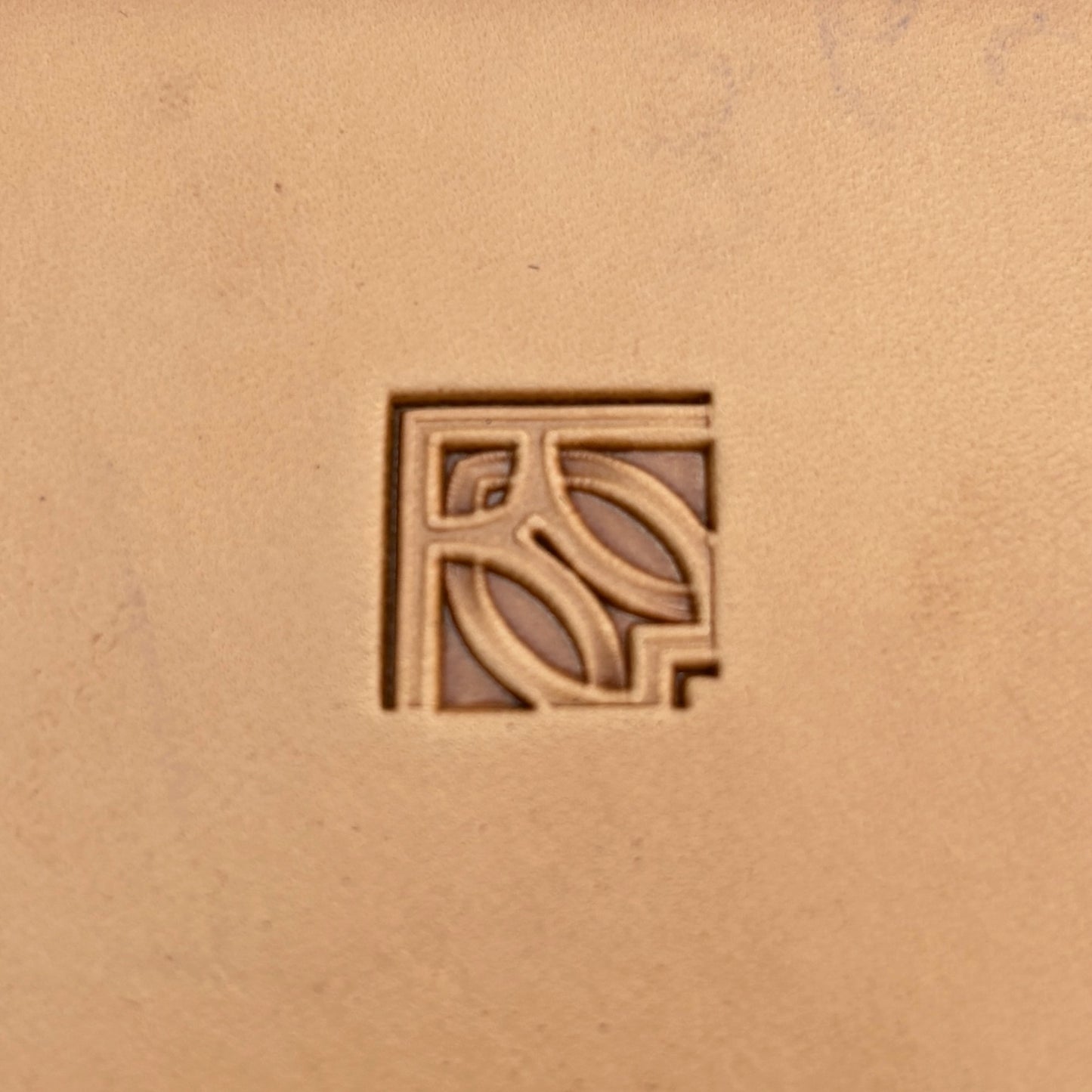 Geometric leather stamp LT100 — pattern imprint on veg-tan leather
