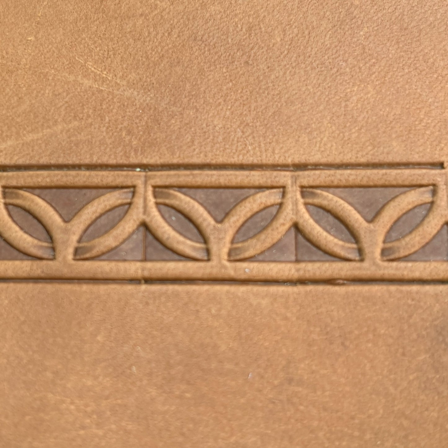 Geometric leather stamp LT100 — pattern imprint on veg-tan leather