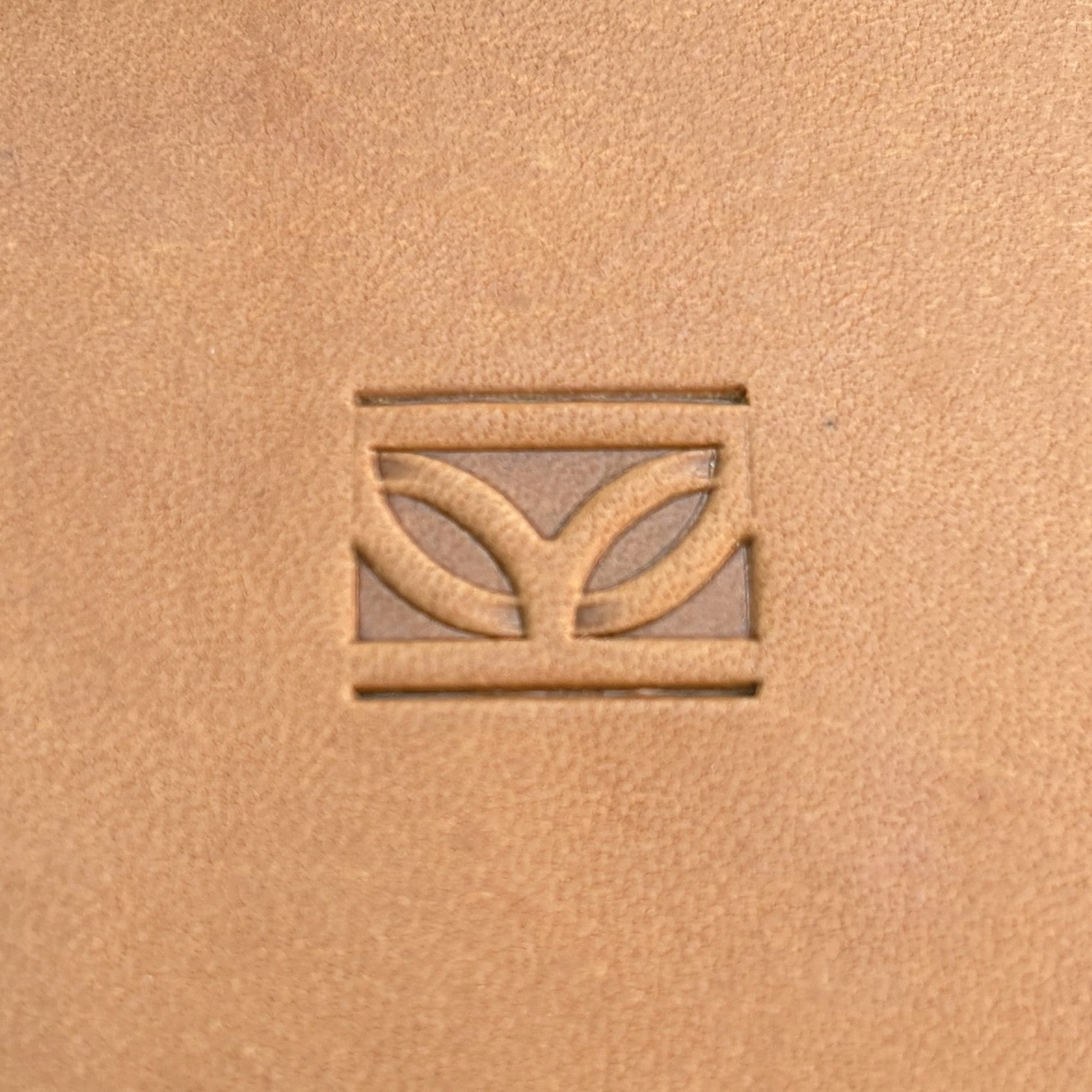 Geometric leather stamp LT100 — single impression on veg-tan leather