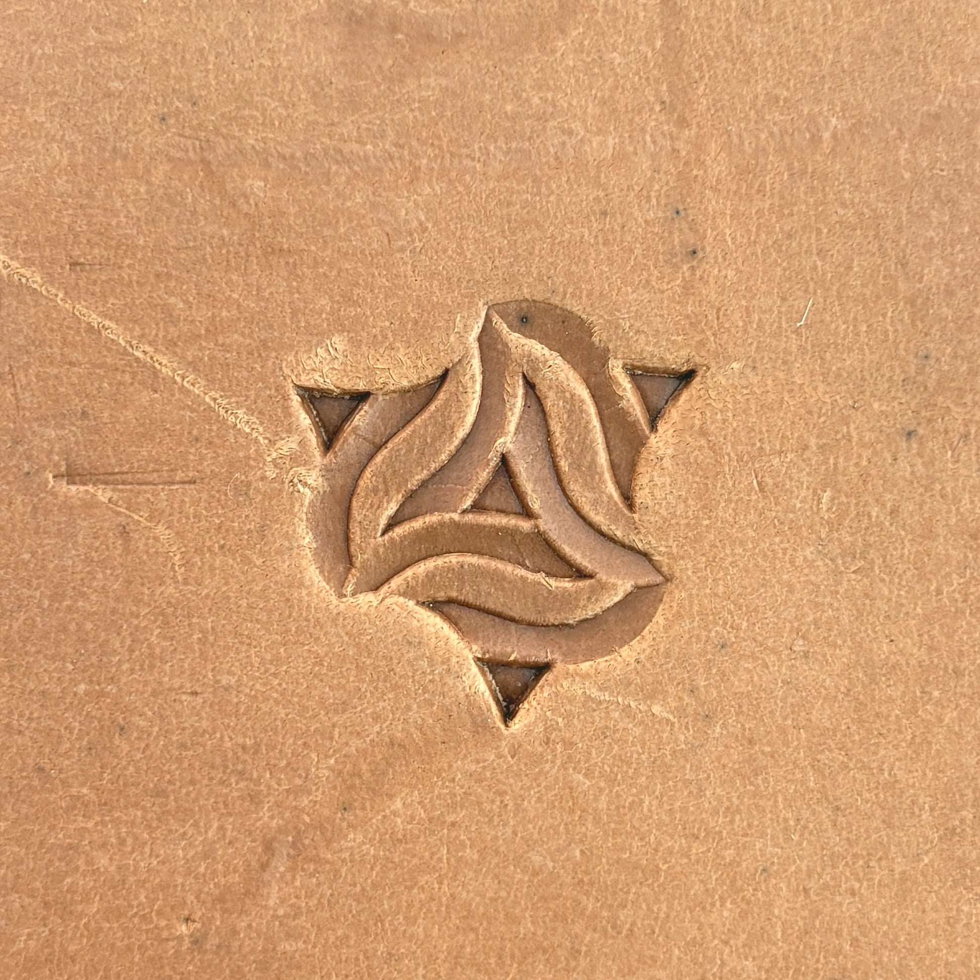 Interlocking Mosaic Geometric leather stamp LT103 — single impression on veg-tan leather