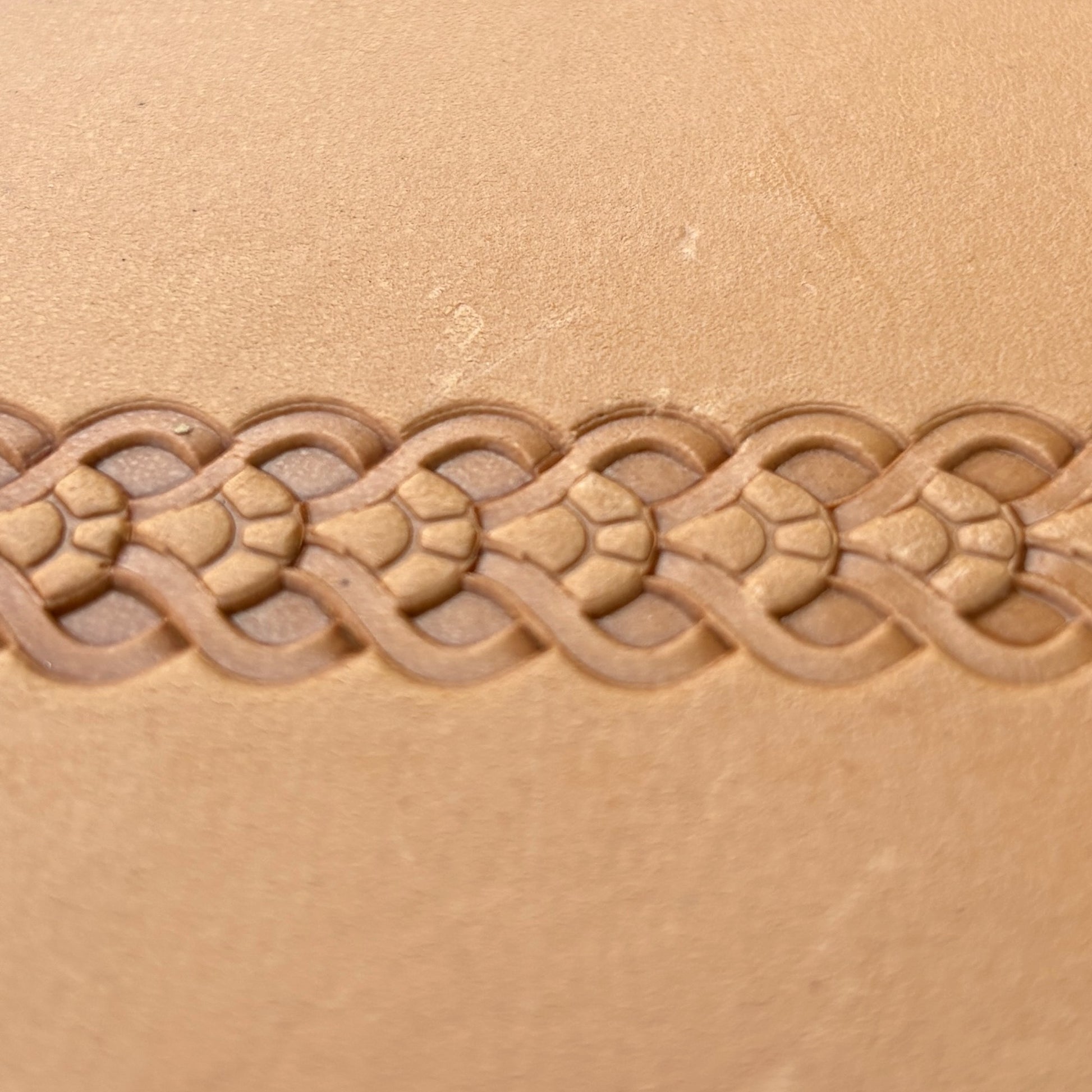 Celtic Knot leather stamp LT106 — single impression on veg-tan leather