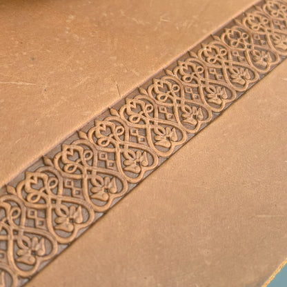 Floral Loop leather stamp LT108 — pattern imprint on veg-tan leather