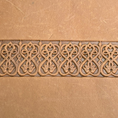 Floral Loop leather stamp LT108 — pattern imprint on veg-tan leather