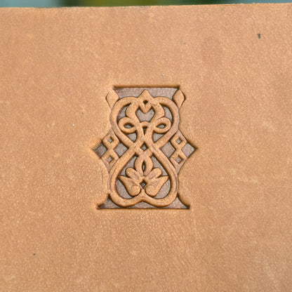 Floral Loop leather stamp LT108 — single impression on veg-tan leather