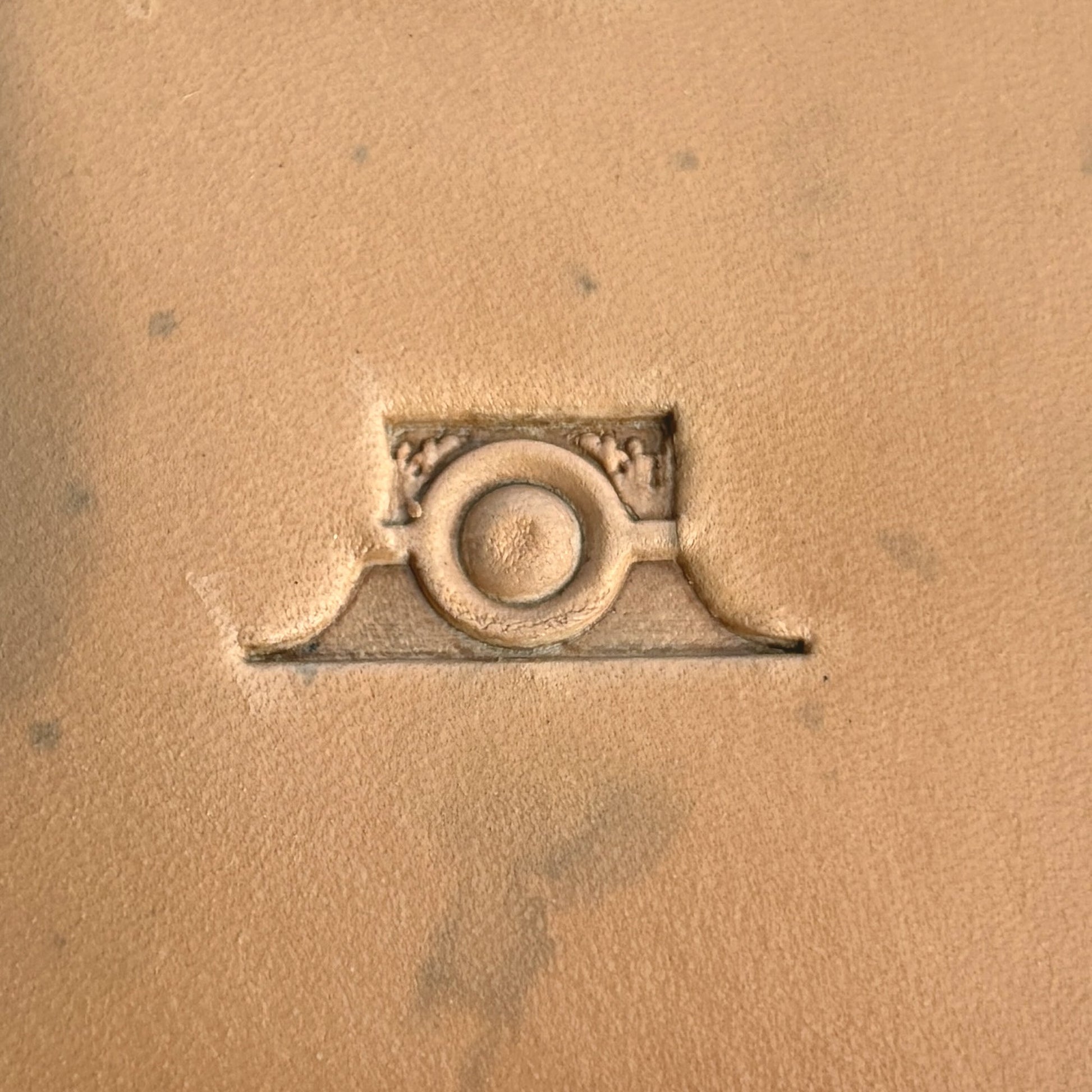 Geometric leather stamp LT111 — single impression on veg-tan leather