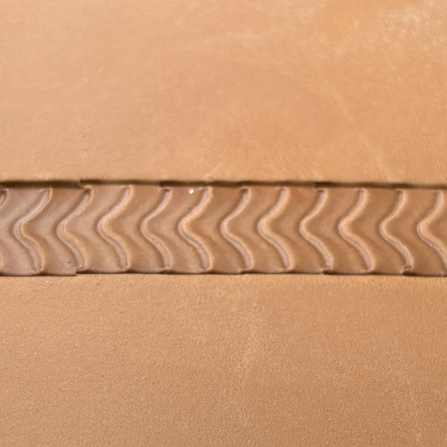 Wavy Line leather stamp LT116 — pattern imprint on veg-tan leather