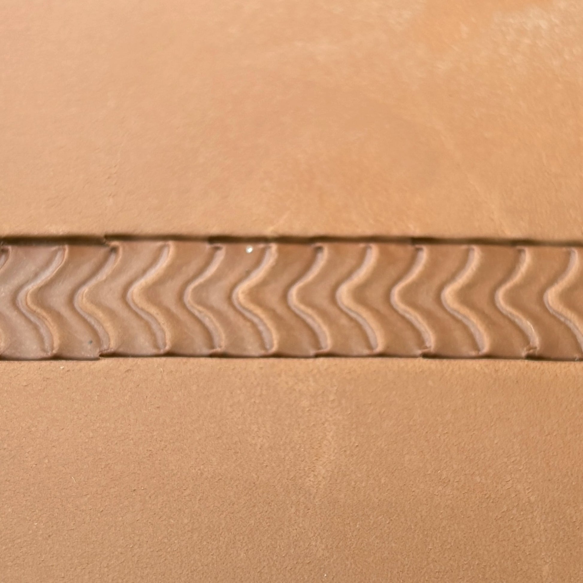 Wavy Line leather stamp LT116 — pattern imprint on veg-tan leather