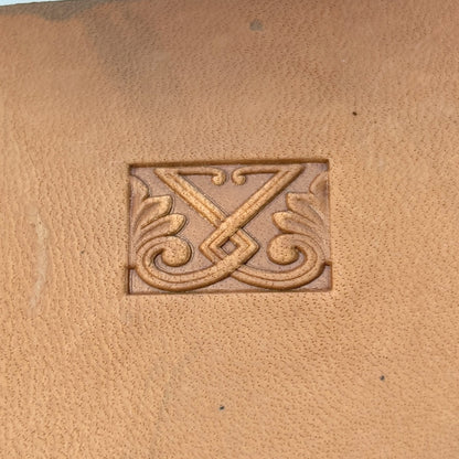 Ornate Shape leather stamp LT117 — single impression on veg-tan leather