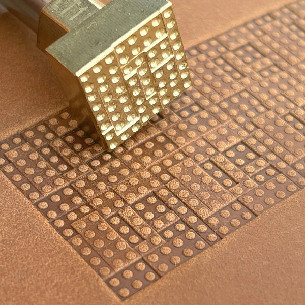 Geometric leather stamp LT118 — brass stamping tool with imprint on natural veg-tan leather