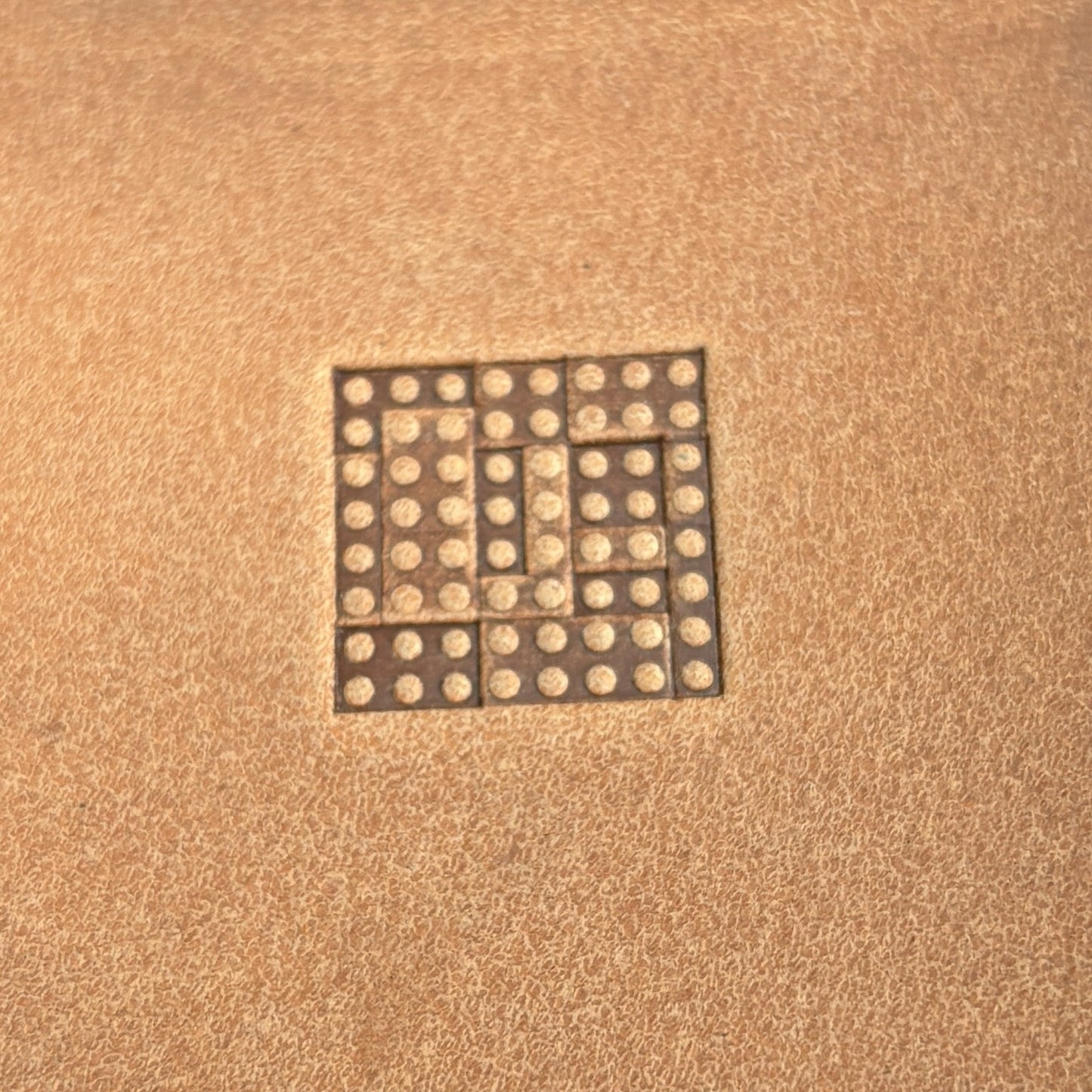 Geometric leather stamp LT118 — single impression on veg-tan leather
