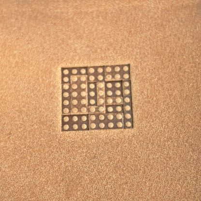 Geometric leather stamp LT118 — single impression on veg-tan leather