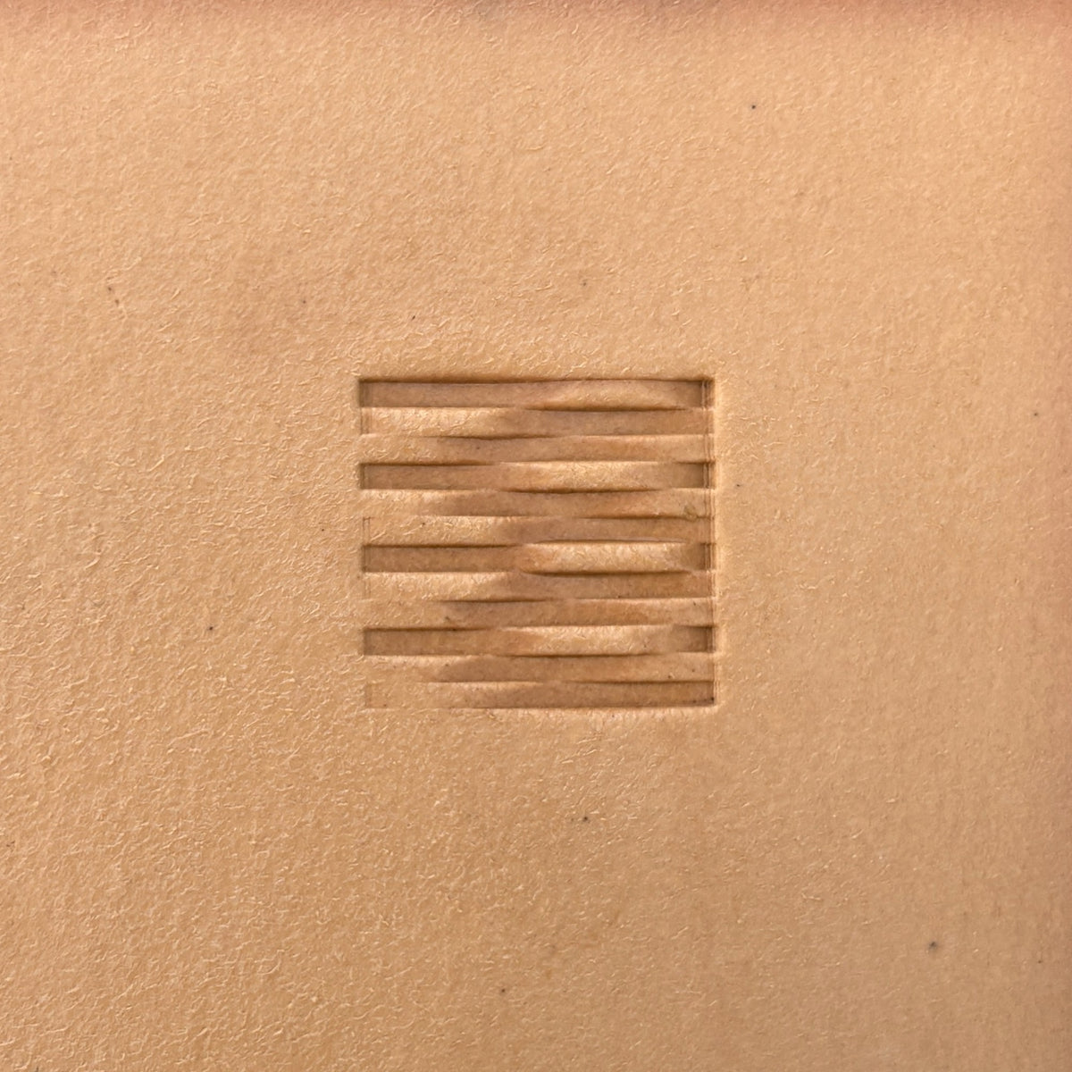 Modern Lines Basket Weave leather stamp LT119 — single impression on veg-tan leather