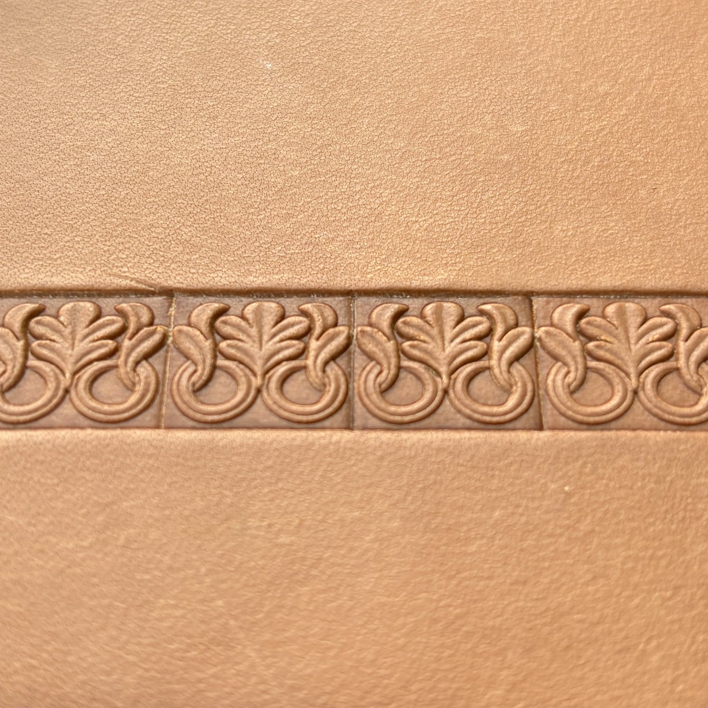 Ornamental leather stamp LT121 — single impression on veg-tan leather