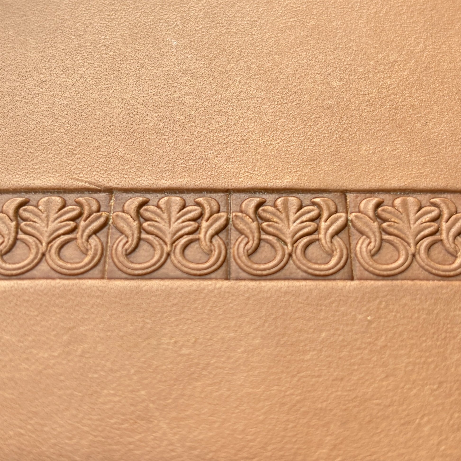 Ornamental leather stamp LT121 — single impression on veg-tan leather