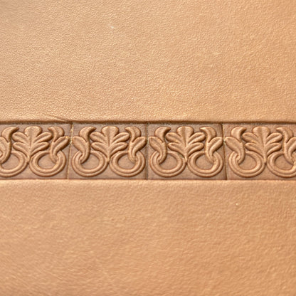 Ornamental leather stamp LT121 — single impression on veg-tan leather