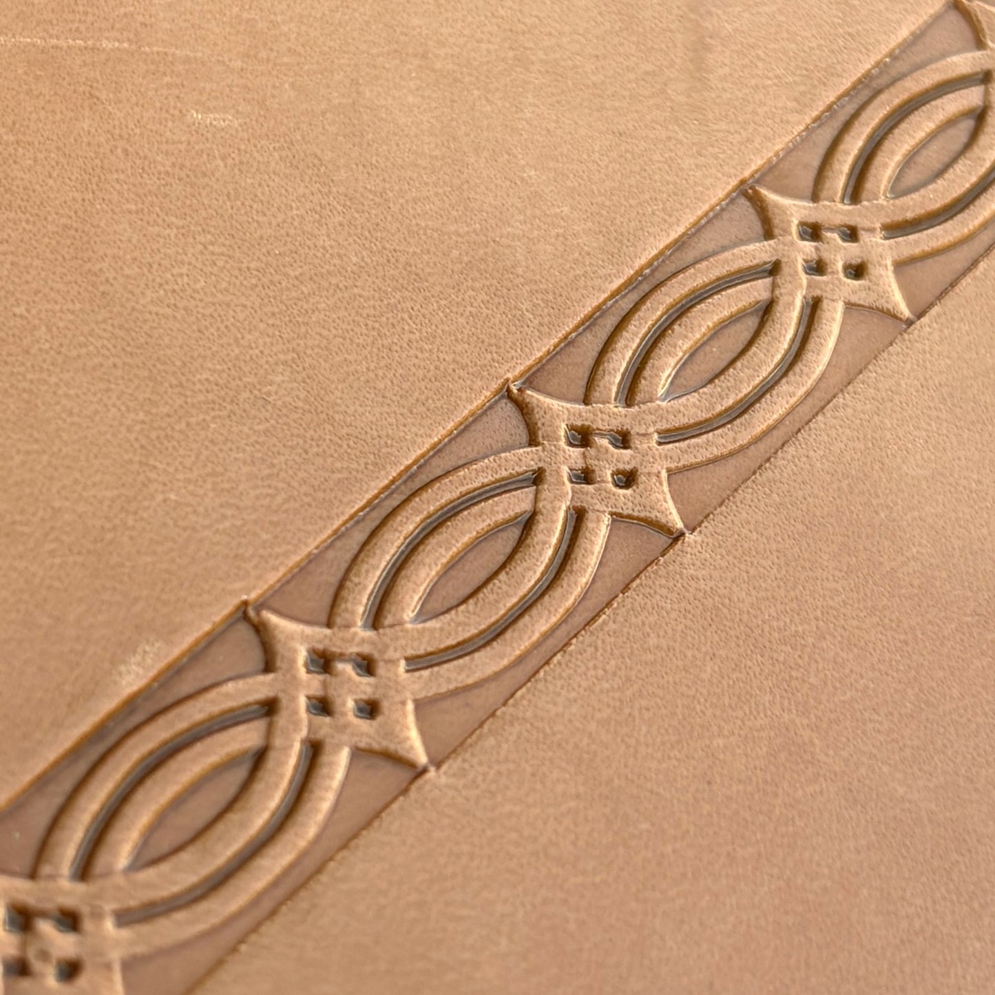 Geometric leather stamp LT125 — imprint on natural veg-tan leather