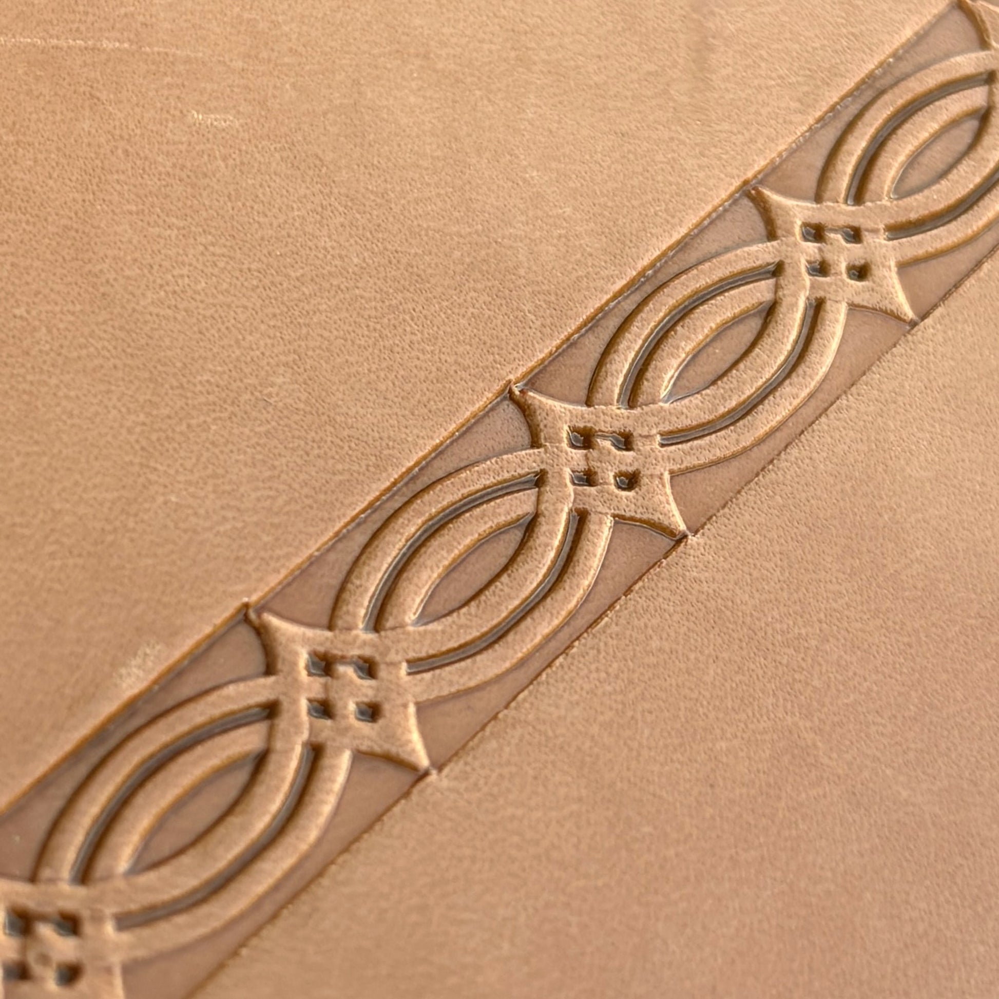 Geometric leather stamp LT125 — imprint on natural veg-tan leather