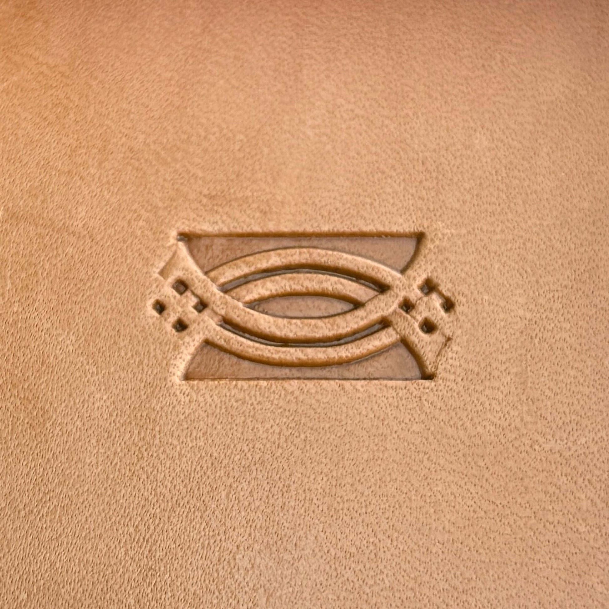 Geometric leather stamp LT125 — single impression on veg-tan leather
