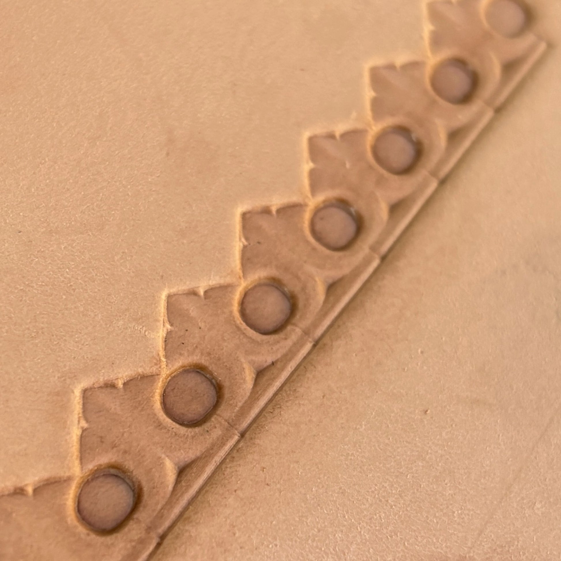 Circle Border leather stamp LT126 — pattern imprint on veg-tan leather