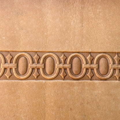 Geometric leather stamp LT127 — brass stamping tool with imprint on natural veg-tan leather