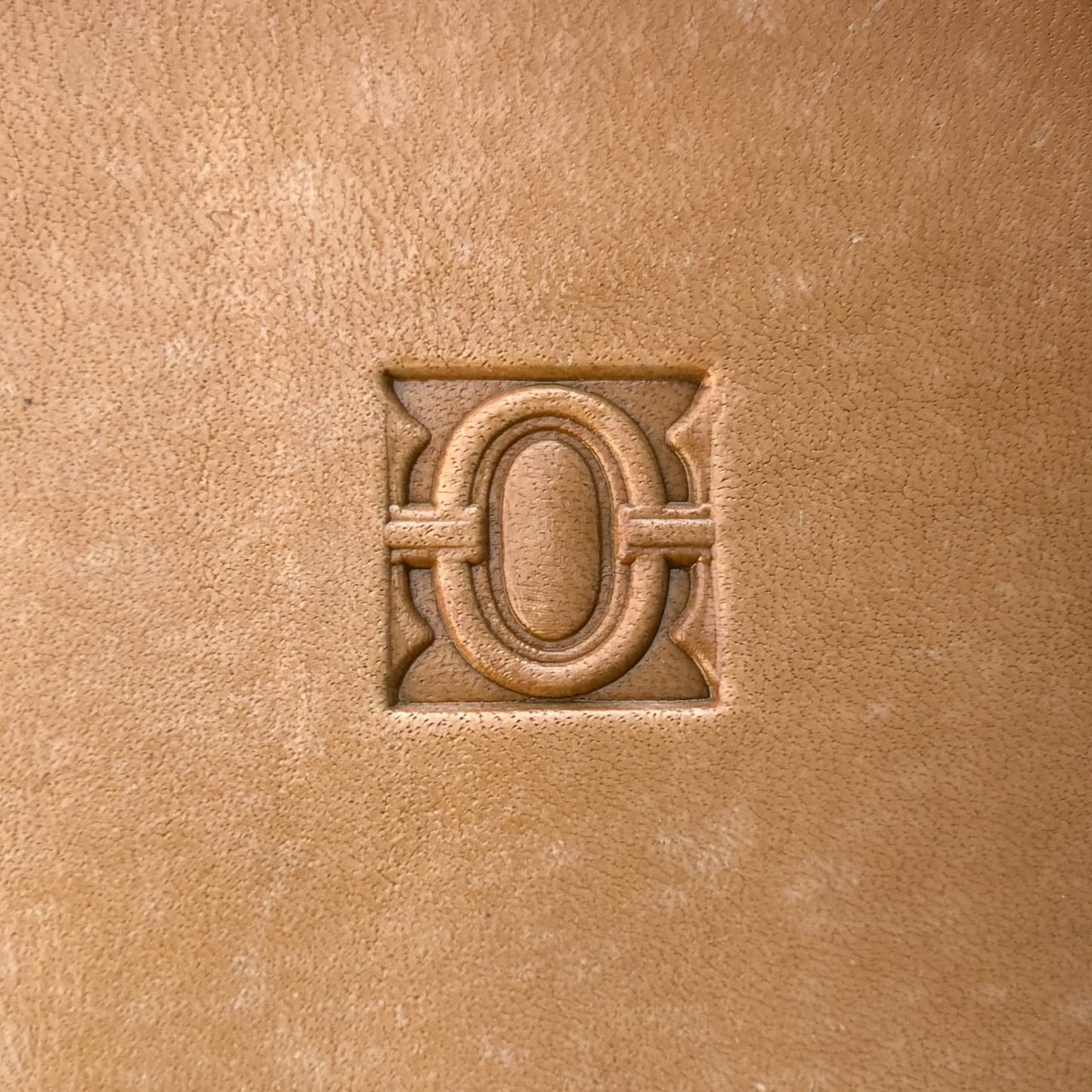 Geometric leather stamp LT127 — single impression on veg-tan leather