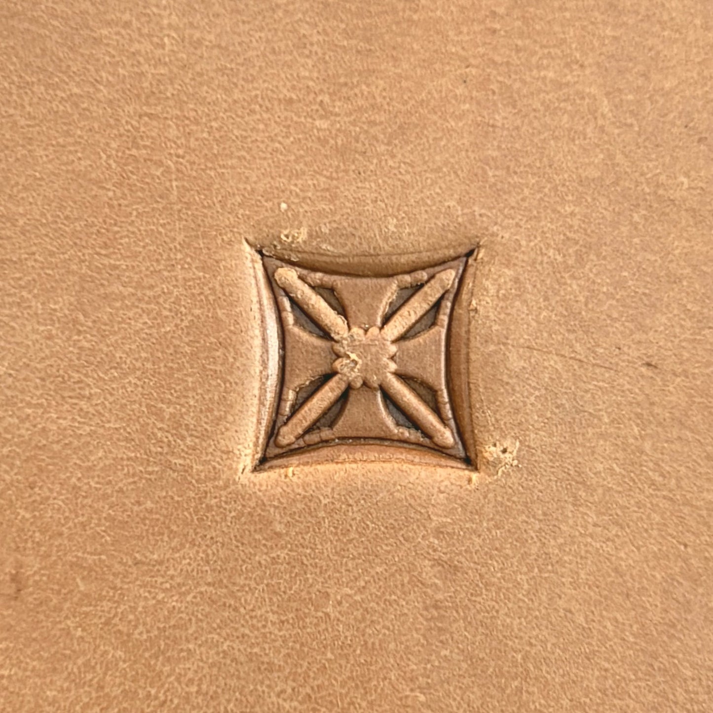 Star Grid Geometric leather stamp LT130 — single impression on veg-tan leather
