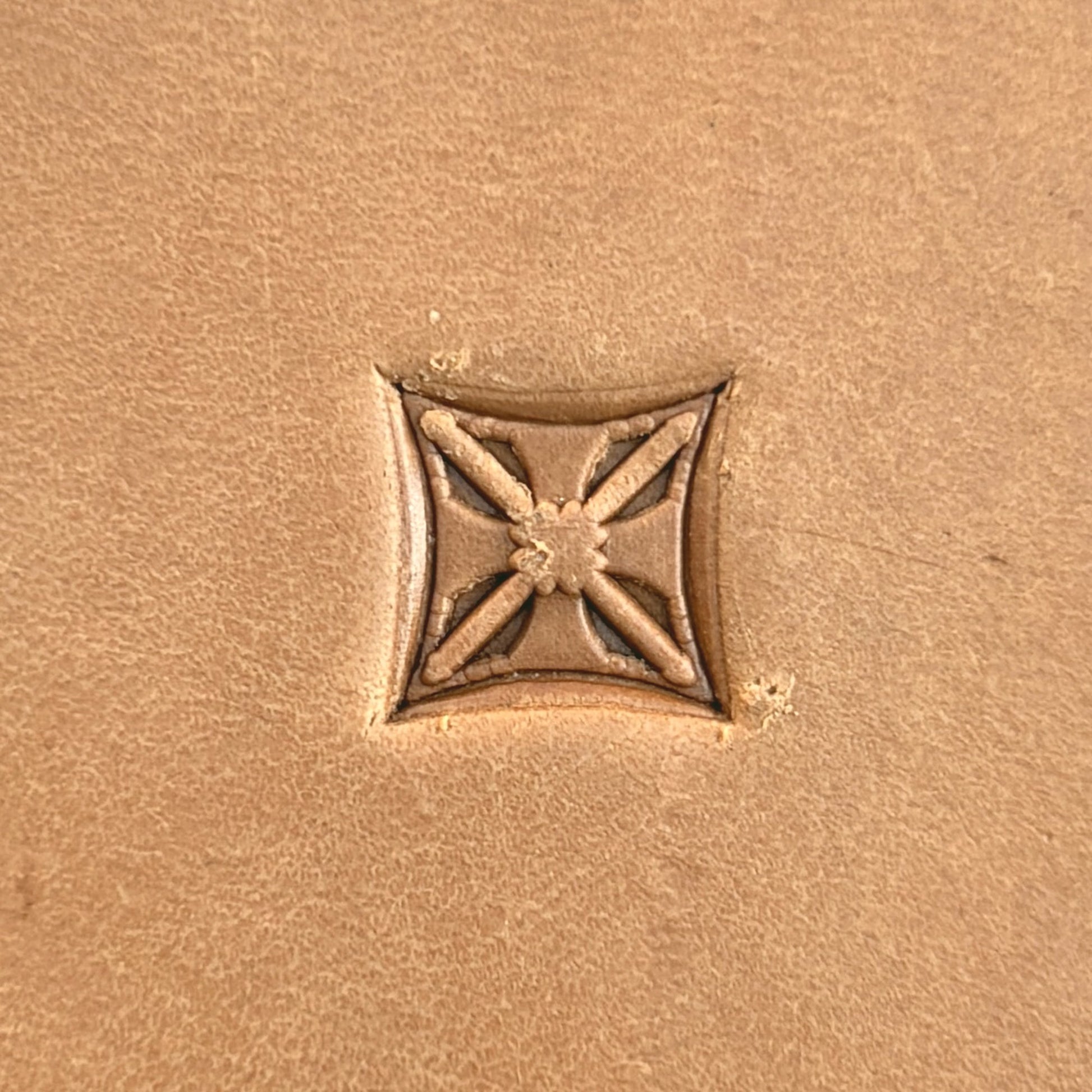 Star Grid Geometric leather stamp LT130 — single impression on veg-tan leather