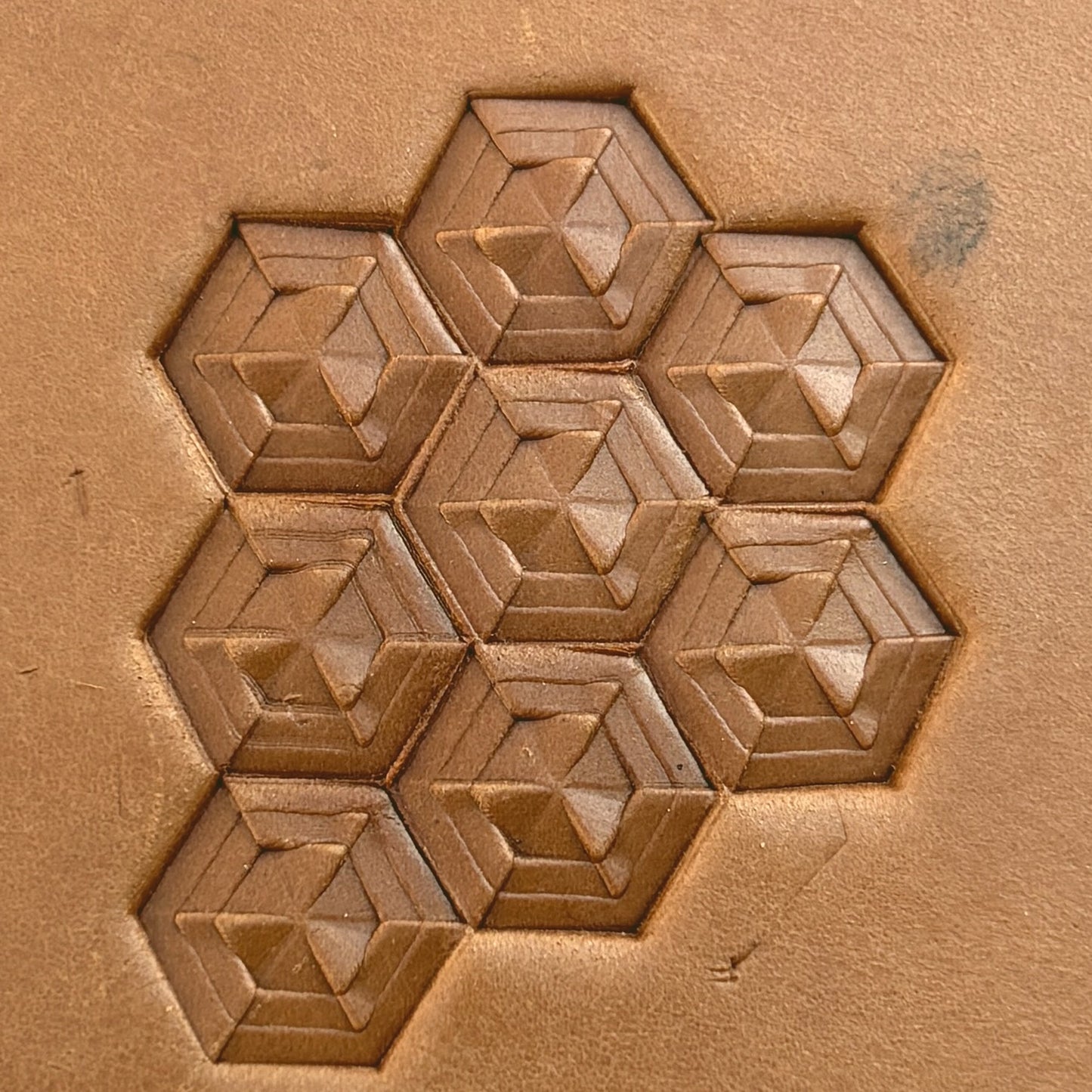 Hexagon Cube Geometric leather stamp LT132 — single impression on veg-tan leather