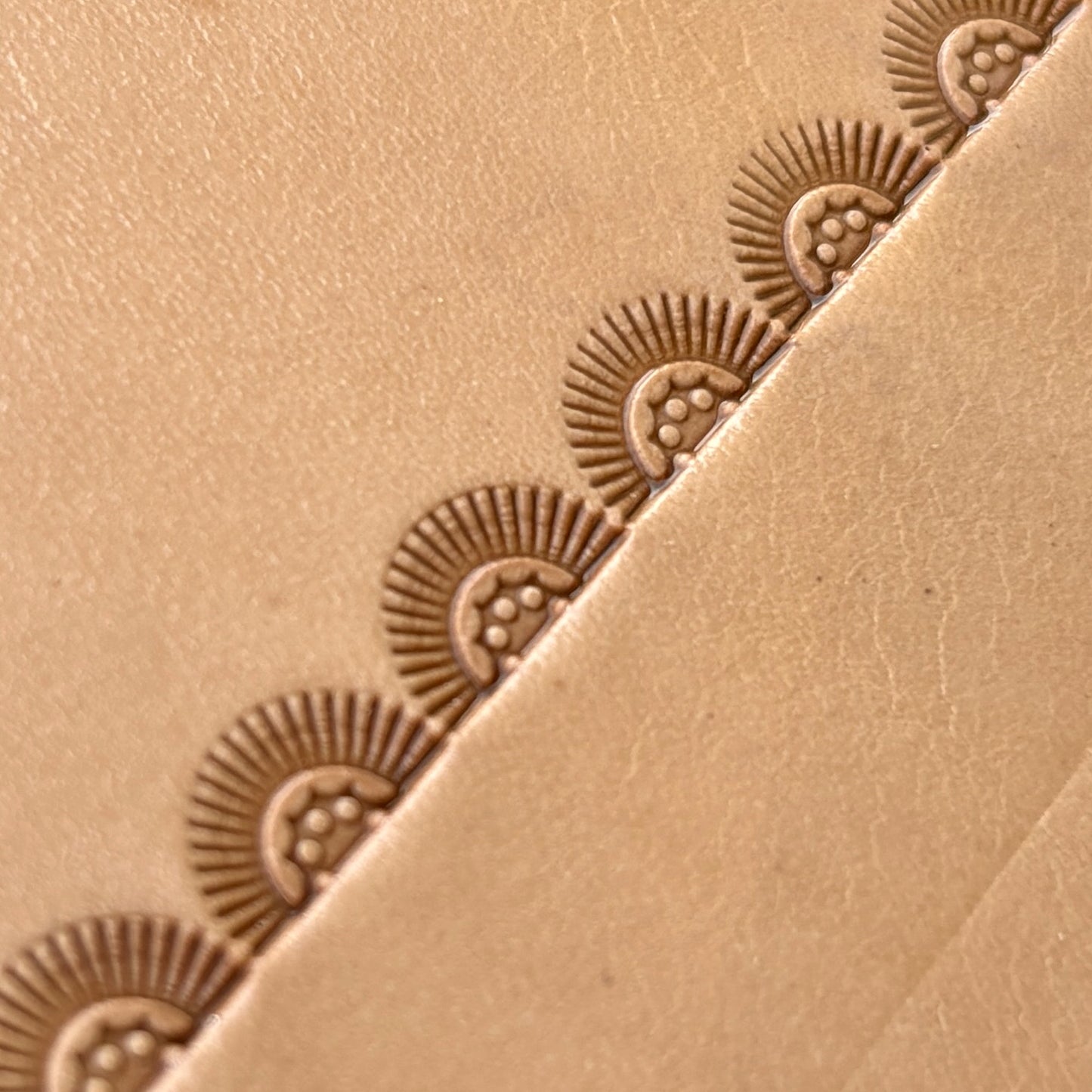 Sunrise leather stamp LT133 — brass stamping tool with imprint on natural veg-tan leather