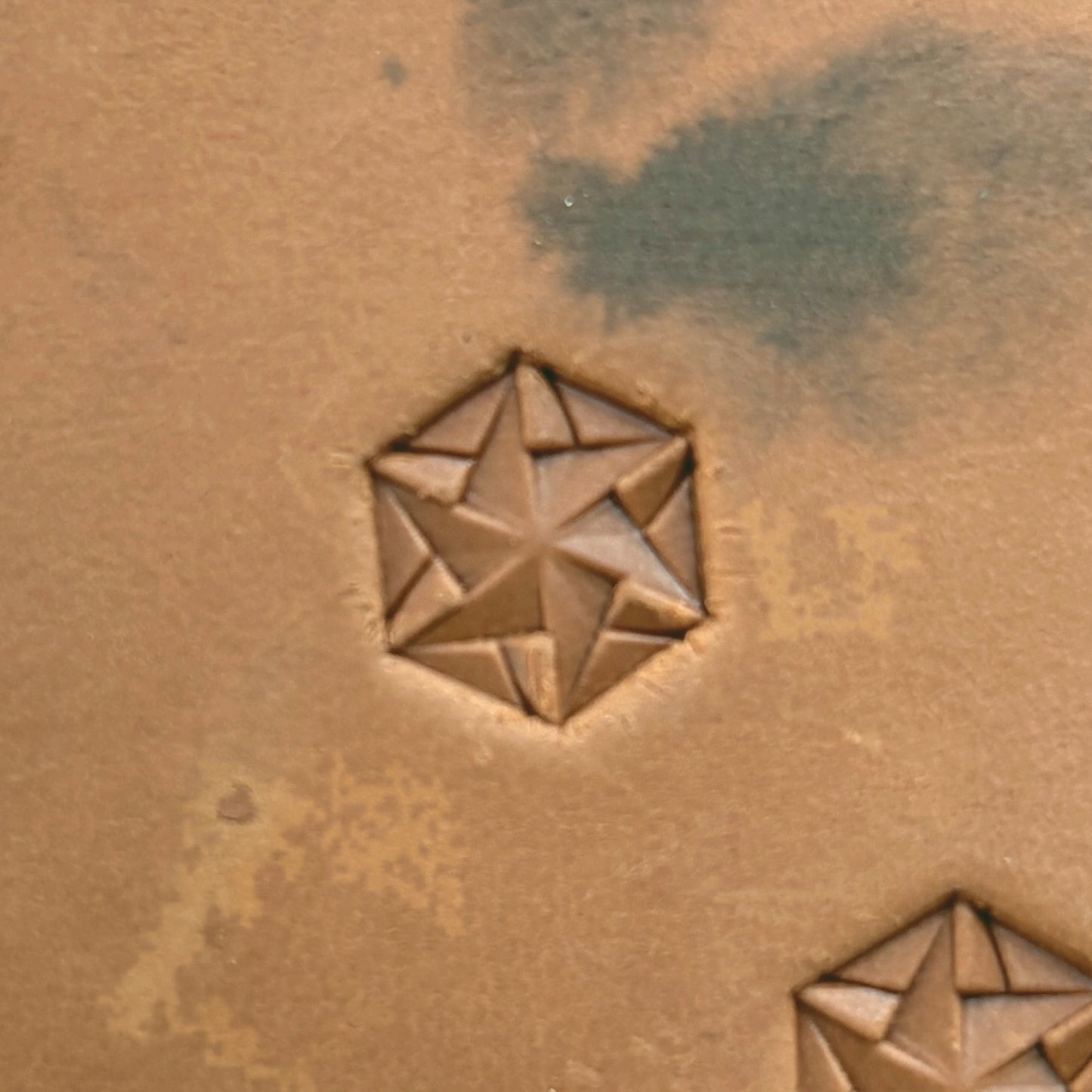 Star Mosaic Geometric leather stamp LT135 — single impression on veg-tan leather