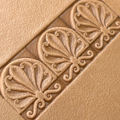 Fleur leather stamp LT136 — imprint on natural veg-tan leather