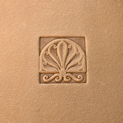 Fleur leather stamp LT136 — single impression on veg-tan leather