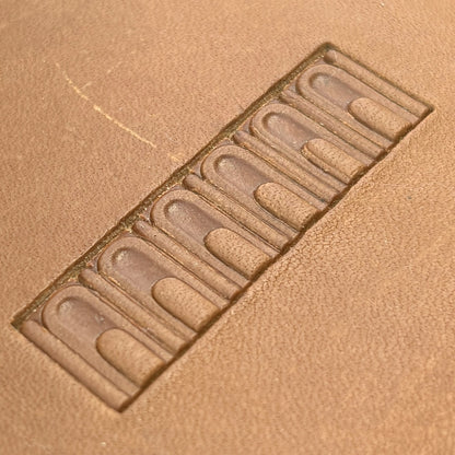 Arch Border Geometric leather stamp LT137 — single impression on veg-tan leather