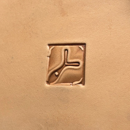 Ornate Tile leather stamp LT139 — single impression on veg-tan leather