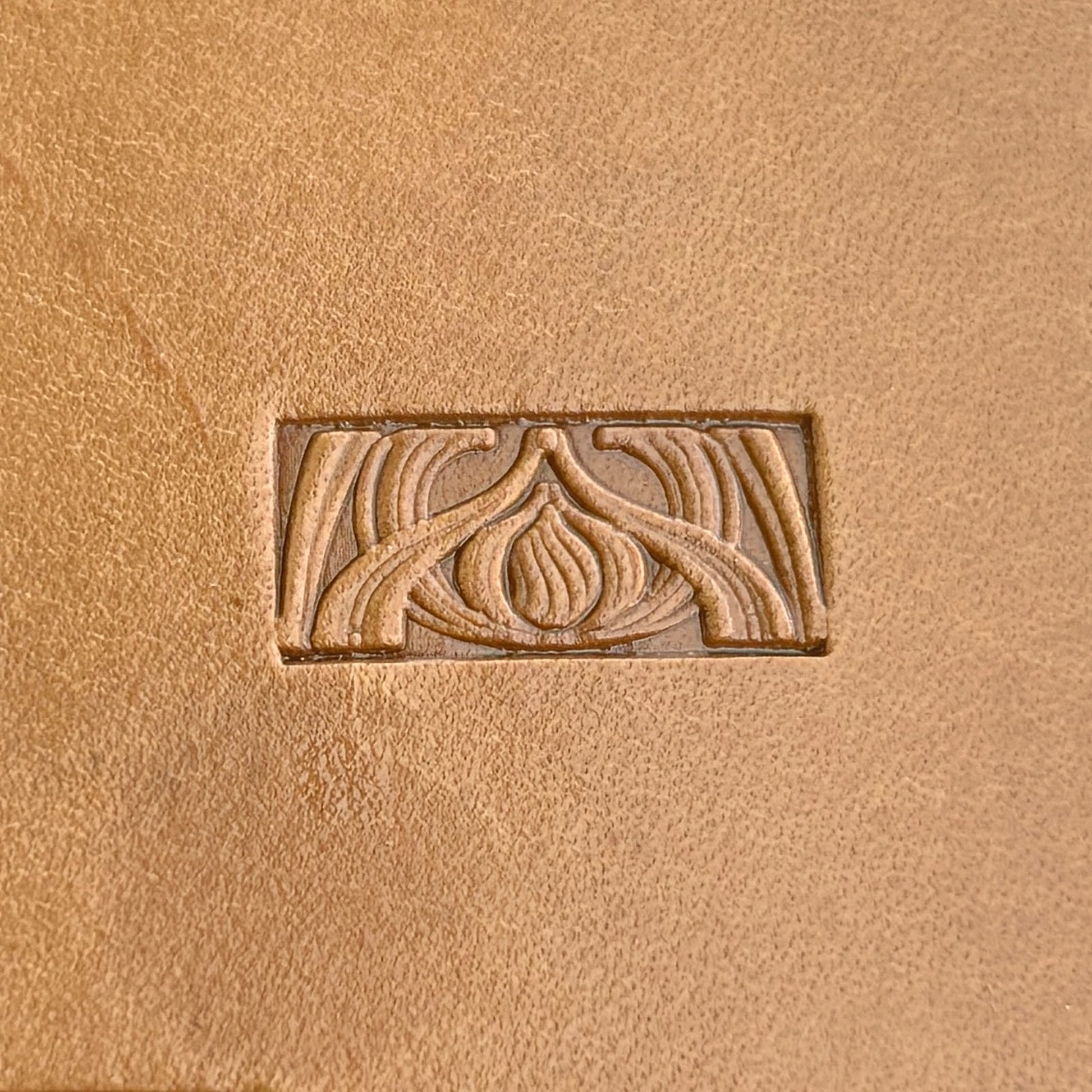 Art Deco leather stamp LT143 — single impression on veg-tan leather