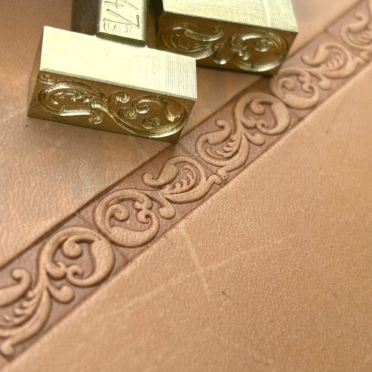 Ornamental Border 1 leather stamp LT147 — brass stamping tool with imprint on natural veg-tan leather