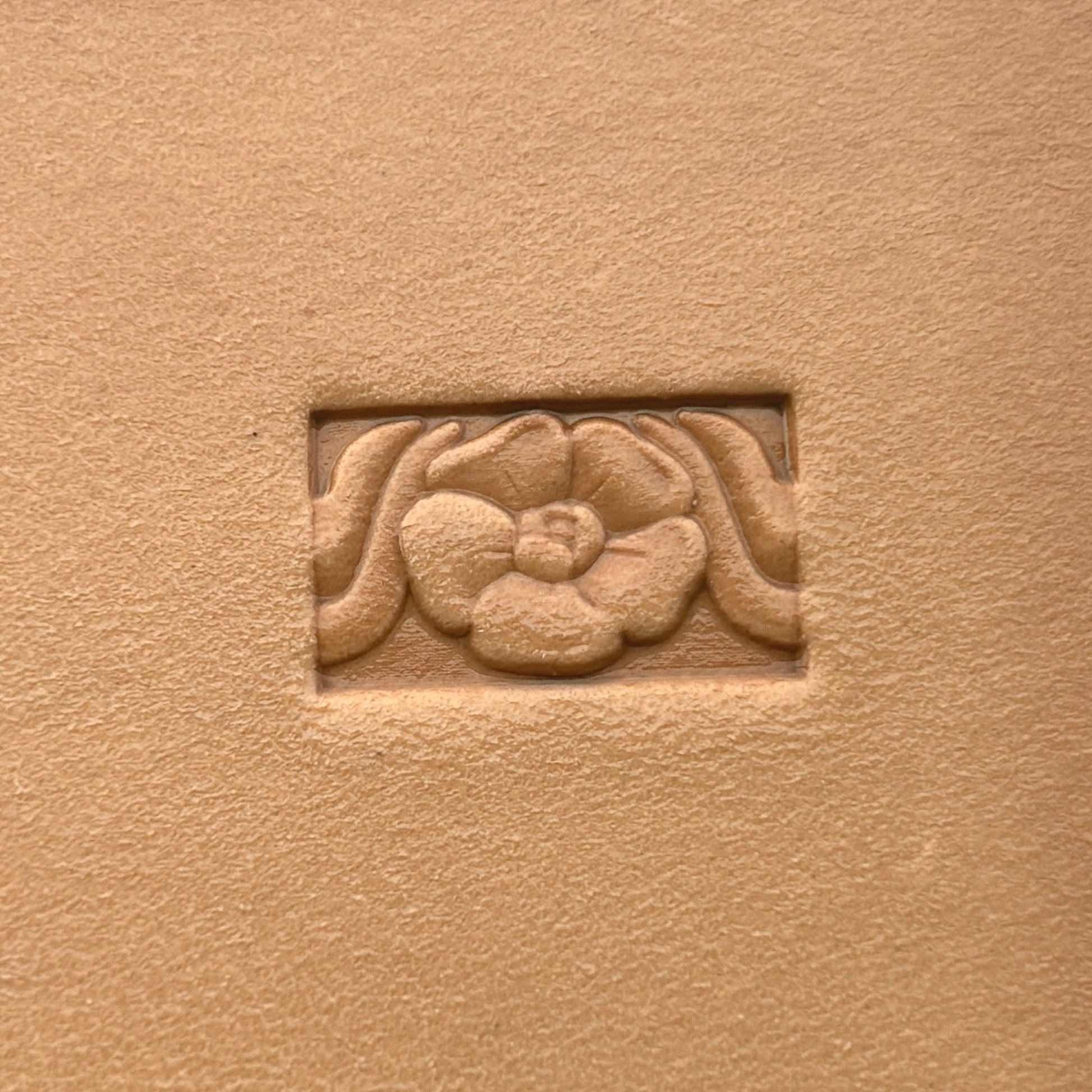Flower leather stamp LT152 — single impression on veg-tan leather