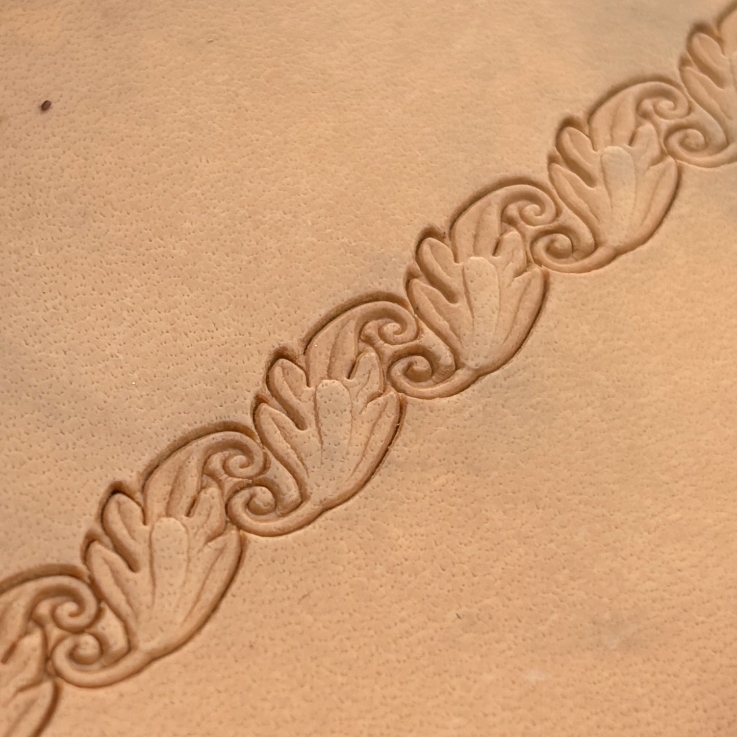 Embossed Vine Border leather stamp LT155 — imprint on natural veg-tan leather