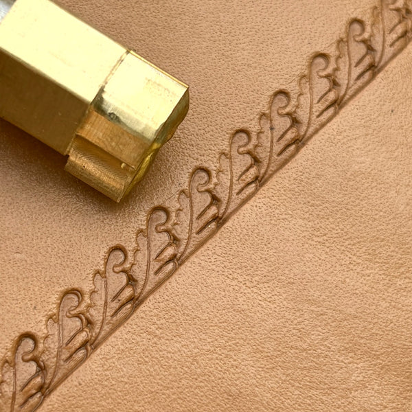 Border Trim Oak Leaf leather stamp LT168 — brass stamping tool with imprint on natural veg-tan leather